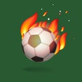 Soccer ball with flames that are on fire, green background