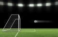 The soccer ball is flying into the goal on the soccer field. ball game concept Royalty Free Stock Photo