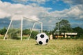 A soccer ball fon the green grass field