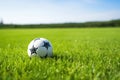 soccer ball on a freshly mowed grass field Royalty Free Stock Photo