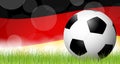 soccer ball in front of german flag