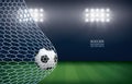 Soccer ball in goal. Football ball and white net in soccer field stadium background. Vector Royalty Free Stock Photo