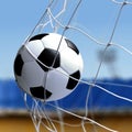 Soccer ball is in goal net Royalty Free Stock Photo