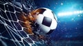 Soccer ball in goal net. Soccer ball tearing and breaking football net. Royalty Free Stock Photo