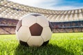 Soccer ball on grass on soccer field stadium Royalty Free Stock Photo