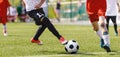 Soccer ball kick moment during a tournament match Royalty Free Stock Photo