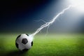 Soccer ball, lightning, spotlight Royalty Free Stock Photo