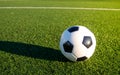 A soccer ball lying on the football pitch. Royalty Free Stock Photo