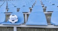 Soccer ball in a medical mask on the background of empty stands . Royalty Free Stock Photo