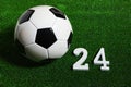 A soccer ball next to a 24 number Royalty Free Stock Photo