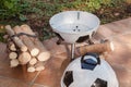 Open brazier in form of soccer ball stands in yard