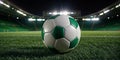 The soccer ball is positioned on the verdant turf, illuminated by a striking beam of light