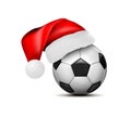 Soccer ball with Santa Claus hat. Football ball. Vector illustration on white background