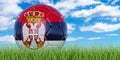 Soccer ball with Serbian flag on the green grass against blue sky, 3D rendering Royalty Free Stock Photo