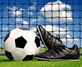 Soccer ball and shoes Royalty Free Stock Photo