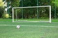 Soccer ball on stadium field Royalty Free Stock Photo