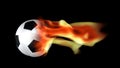 Soccer ball surrounded by flames Royalty Free Stock Photo