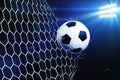 Soccer ball tearing and breaking football goal net Royalty Free Stock Photo