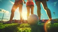 A soccer ball on the turf of a soccer field at sunset. Royalty Free Stock Photo