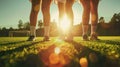 A soccer ball on the turf of a soccer field at sunset. Royalty Free Stock Photo