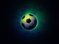 Soccer ball vigorously green background Royalty Free Stock Photo
