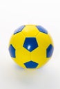 Soccer ball yellow-blue on a white background ,