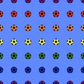 Soccer balls in rainbow colors on a blue background. Seamless pattern. Funny Football wallpaper