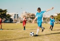 Soccer, boys running and kicking ball on field in summer, motivation and sports workout goals. Football, teamwork and Royalty Free Stock Photo