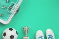 Soccer concept with football table game, cup and ball Royalty Free Stock Photo