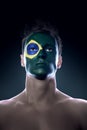 Soccer fan painted flag on his face Royalty Free Stock Photo