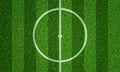 Soccer field in football stadium with line grass pattern and centerline circle. Sports background and athletic wallpaper concept. Royalty Free Stock Photo