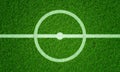 Soccer field in football stadium with line grass pattern and centerline circle. Sports background and athletic wallpaper concept. Royalty Free Stock Photo