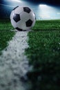 Soccer field with soccer ball and line, side view Royalty Free Stock Photo