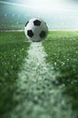Soccer field with soccer ball and line, side view Royalty Free Stock Photo