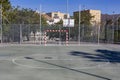 Soccer field among tall houses in the city Royalty Free Stock Photo