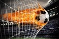 Soccer fireball scores a goal on the net Royalty Free Stock Photo
