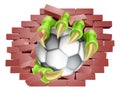 Soccer Football Ball Claw Breaking Through Wall Royalty Free Stock Photo