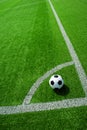 Soccer, football, ball, on corner spot, white marks, classic black and white on clean green field, space for text, good for banner