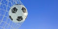 Soccer football. Soccer ball  in goal net on blue background. 3d illustration Royalty Free Stock Photo