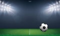 Soccer football ball and green grass of soccer field stadium background. Vector Royalty Free Stock Photo