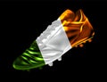 Soccer football boot with the flag of Ireland printed on it Royalty Free Stock Photo