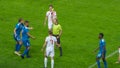 Soccer Football Championship Match: Referee Sees Foul, Gives Signal and Yellow Card, Players Circle Royalty Free Stock Photo