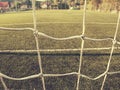 Soccer or football corner lines through safety net Royalty Free Stock Photo