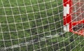 Soccer football field close up. Sports net at the football goal. Doing sports on the playground and healthy lifestyle concept Royalty Free Stock Photo