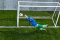 Soccer football goalkeeper making diving save Royalty Free Stock Photo