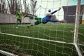 Soccer football goalkeeper making diving save Royalty Free Stock Photo