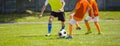 Soccer Football Match. Kids Playing Soccer. Young Boys Kicking Football Royalty Free Stock Photo