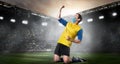 Soccer or football player in mask Royalty Free Stock Photo