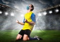 Soccer or football player in mask Royalty Free Stock Photo