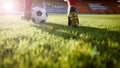 Soccer or football player standing with ball on the field for Ki Royalty Free Stock Photo